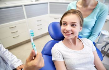Pediatric Patient Talking to Dentist Marietta GA