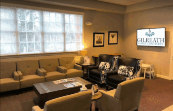 Gilreath Family Dentistry's welcoming waiting room with comfortable seating and modern decor at 200 White St NW, Marietta, G.