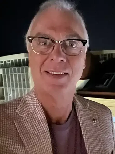 Dr. Paul Gilreath wearing glasses and smiling at the camera